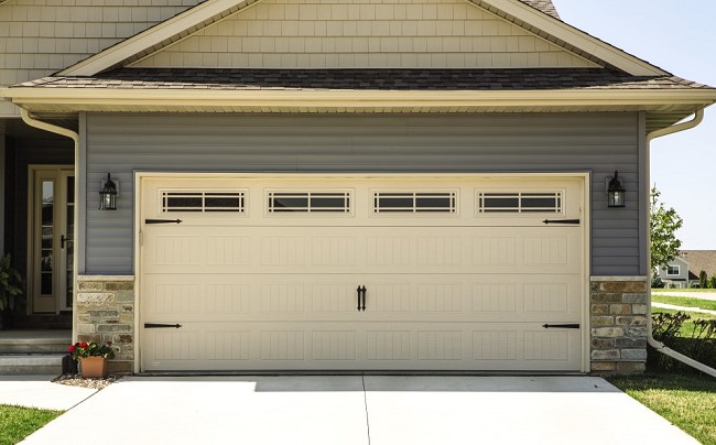 steel garage door with black hardware