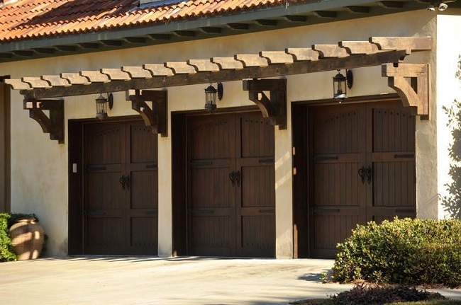 wood garage door with pergola