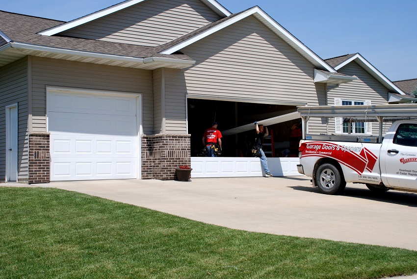 overhead door professionals installing garage door