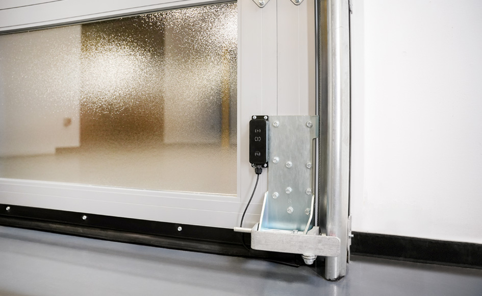 close up of aluminum commercial door sensor