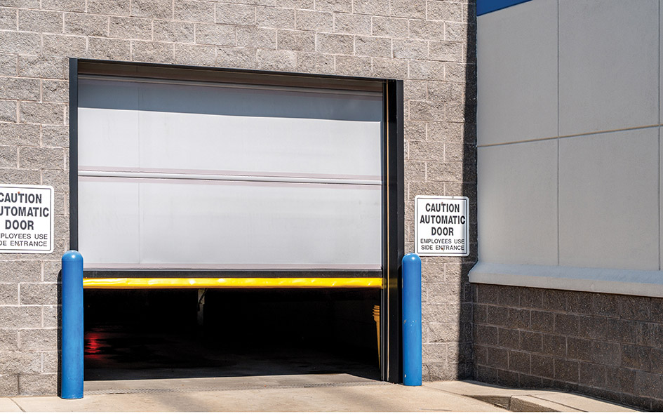 gray commercial door half way up