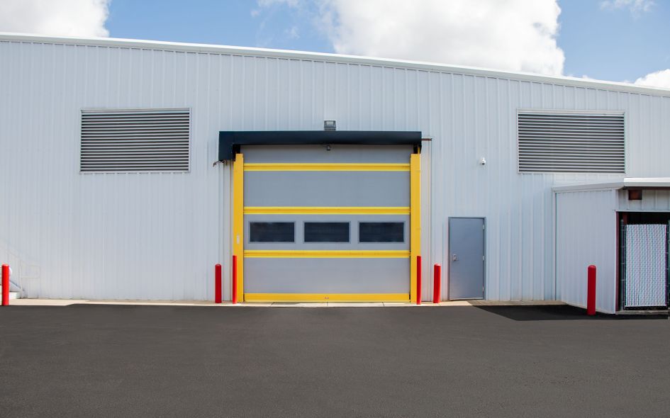 Rapidflex high speed fabric doors in grey. Single door head on.