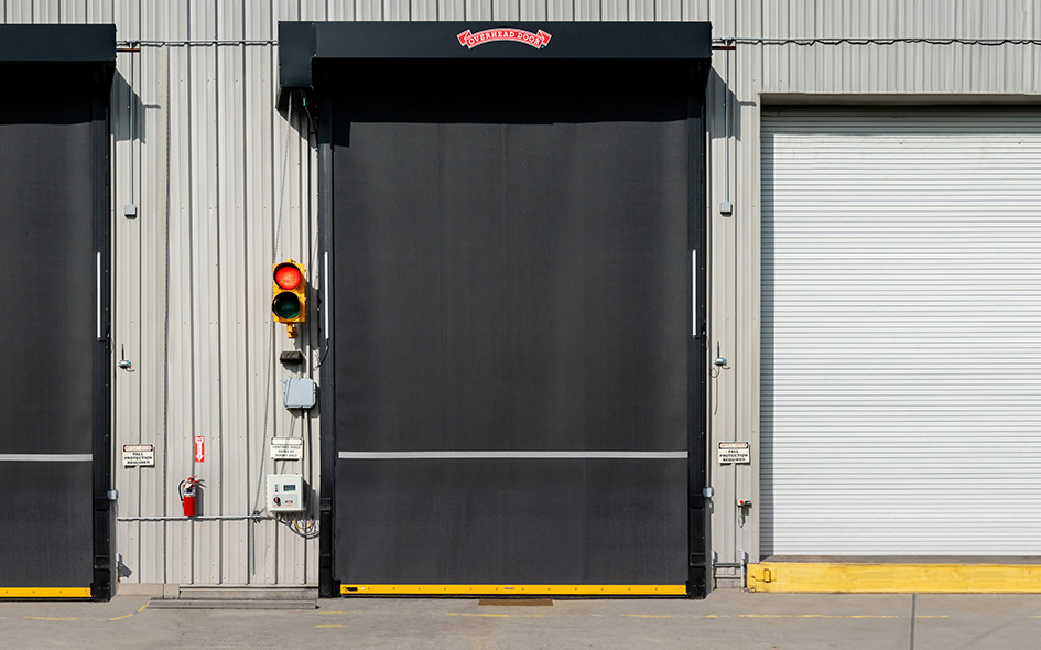 black high speed rubber door on commercial building