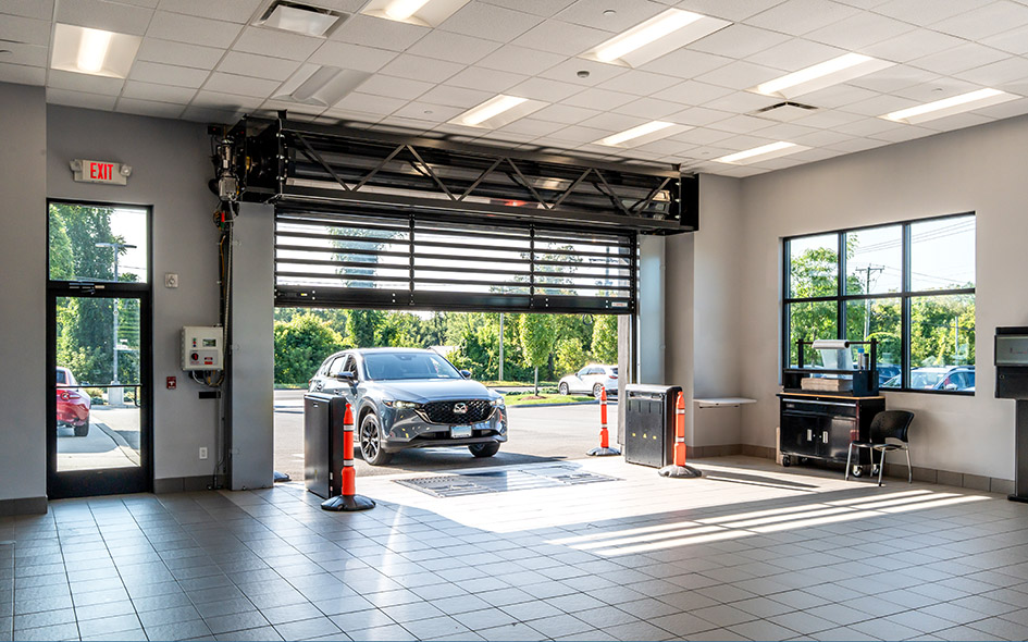 car entering building through a commercial door