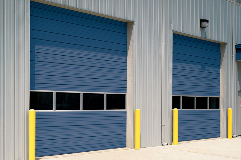 two blue sectional steel commercial doors