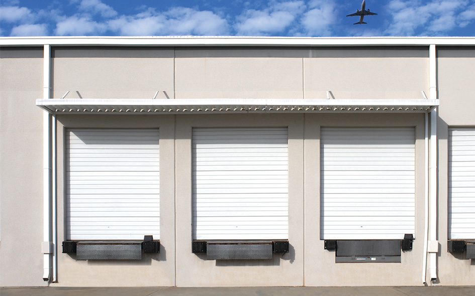 white wind loaded steel commercial doors