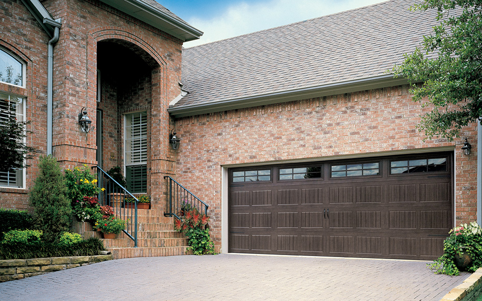 walnut vertical short panel insulated steel garage door