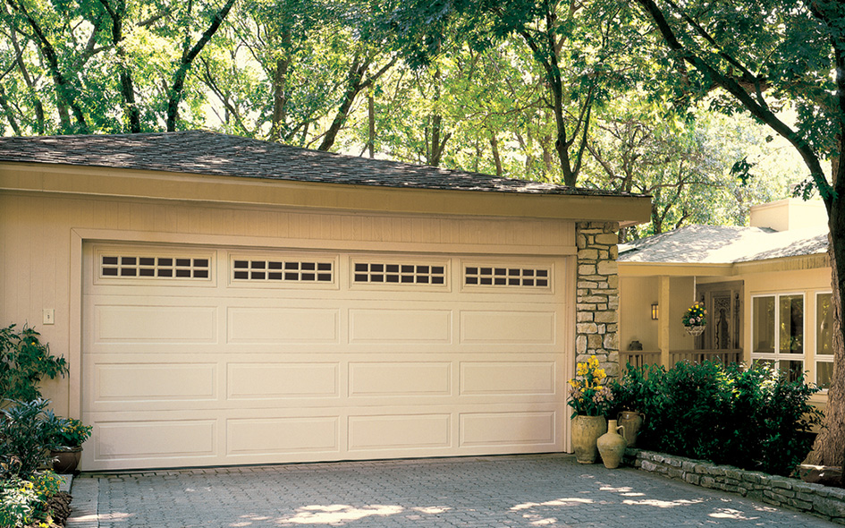 almond traditional steel garage door